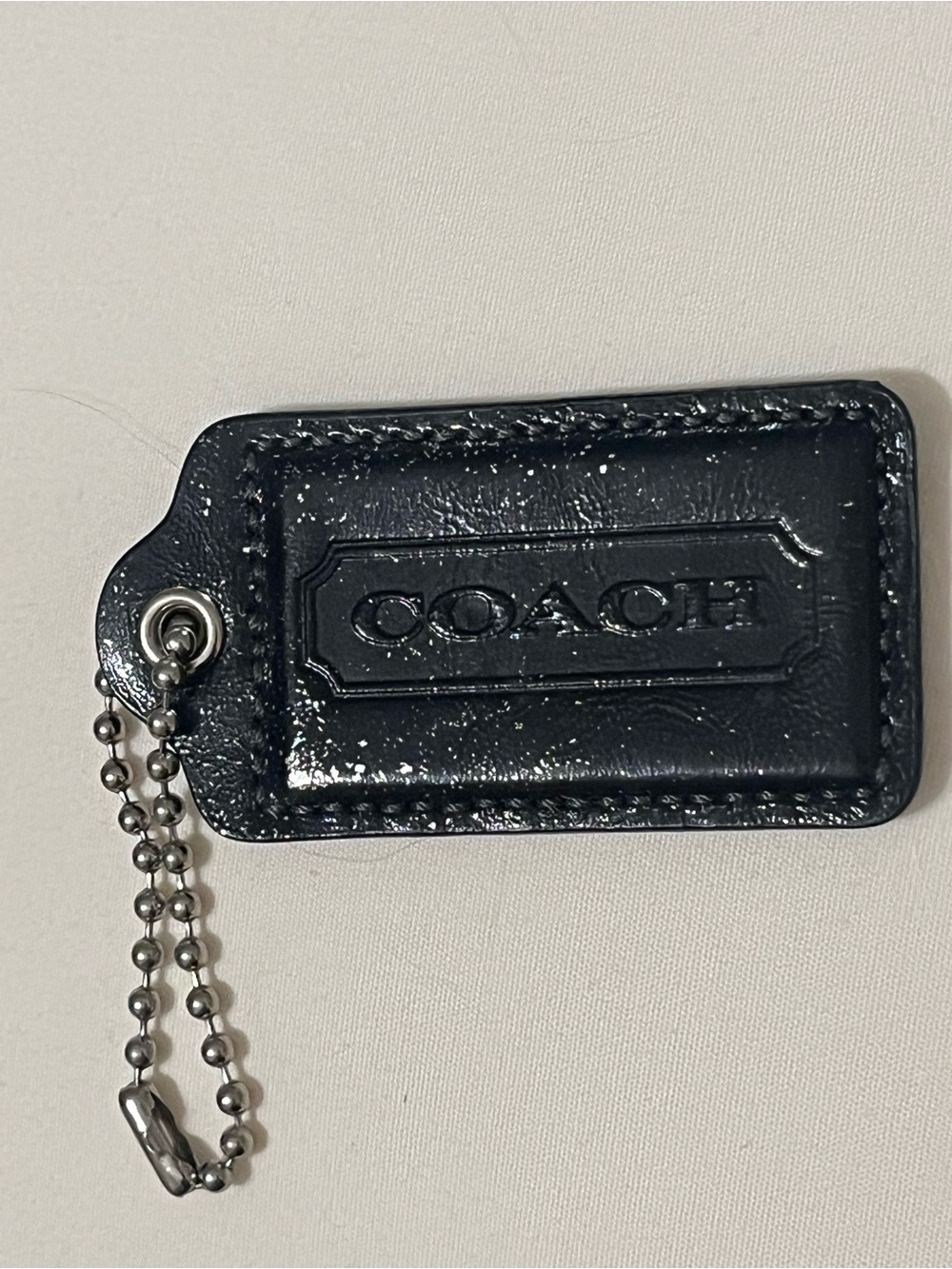 Coach Hang Tag